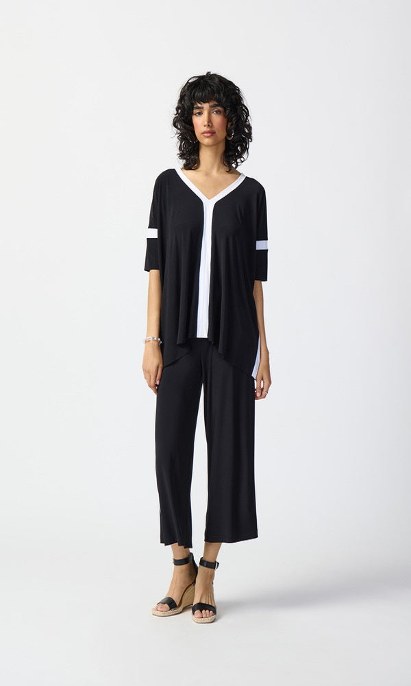 Pantalón negro amplio con franja vainilla 241058