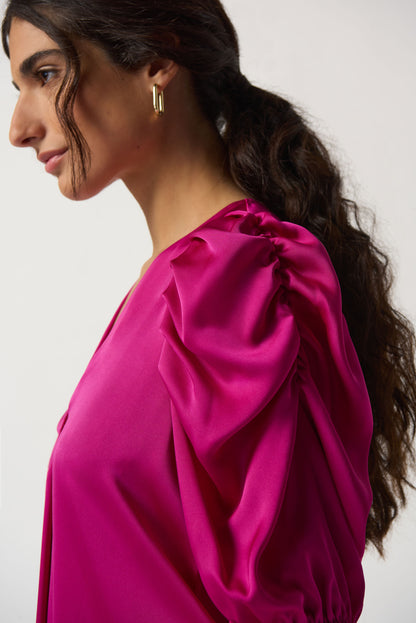 Blusa con mangas abullonadas fucsia 233026