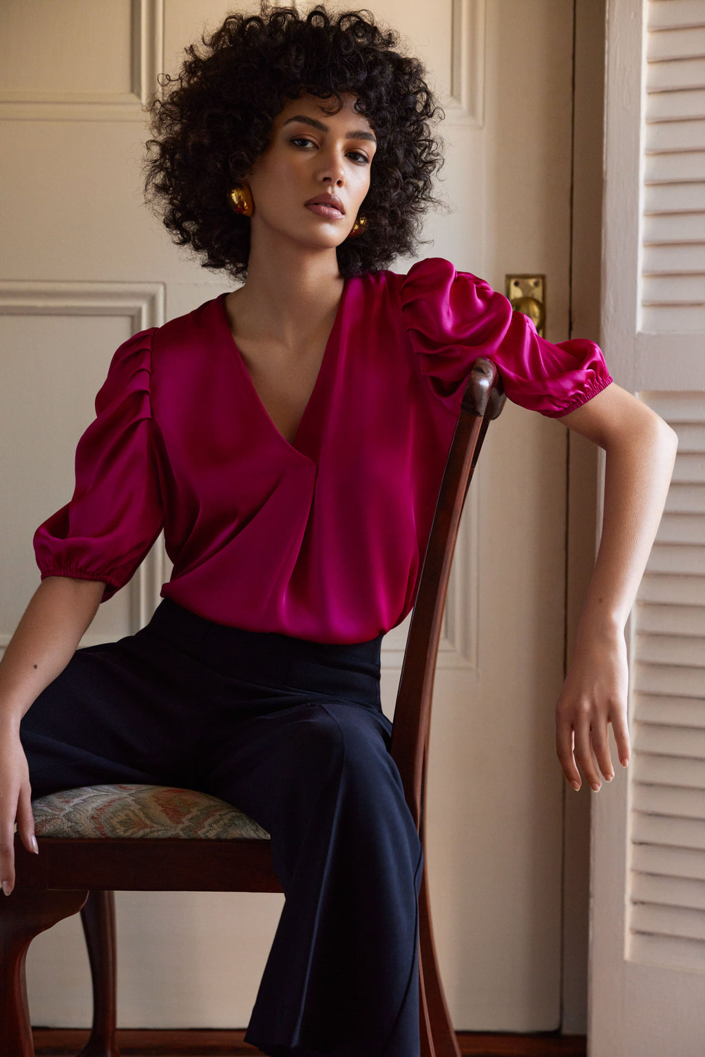 Blusa con mangas abullonadas fucsia 233026