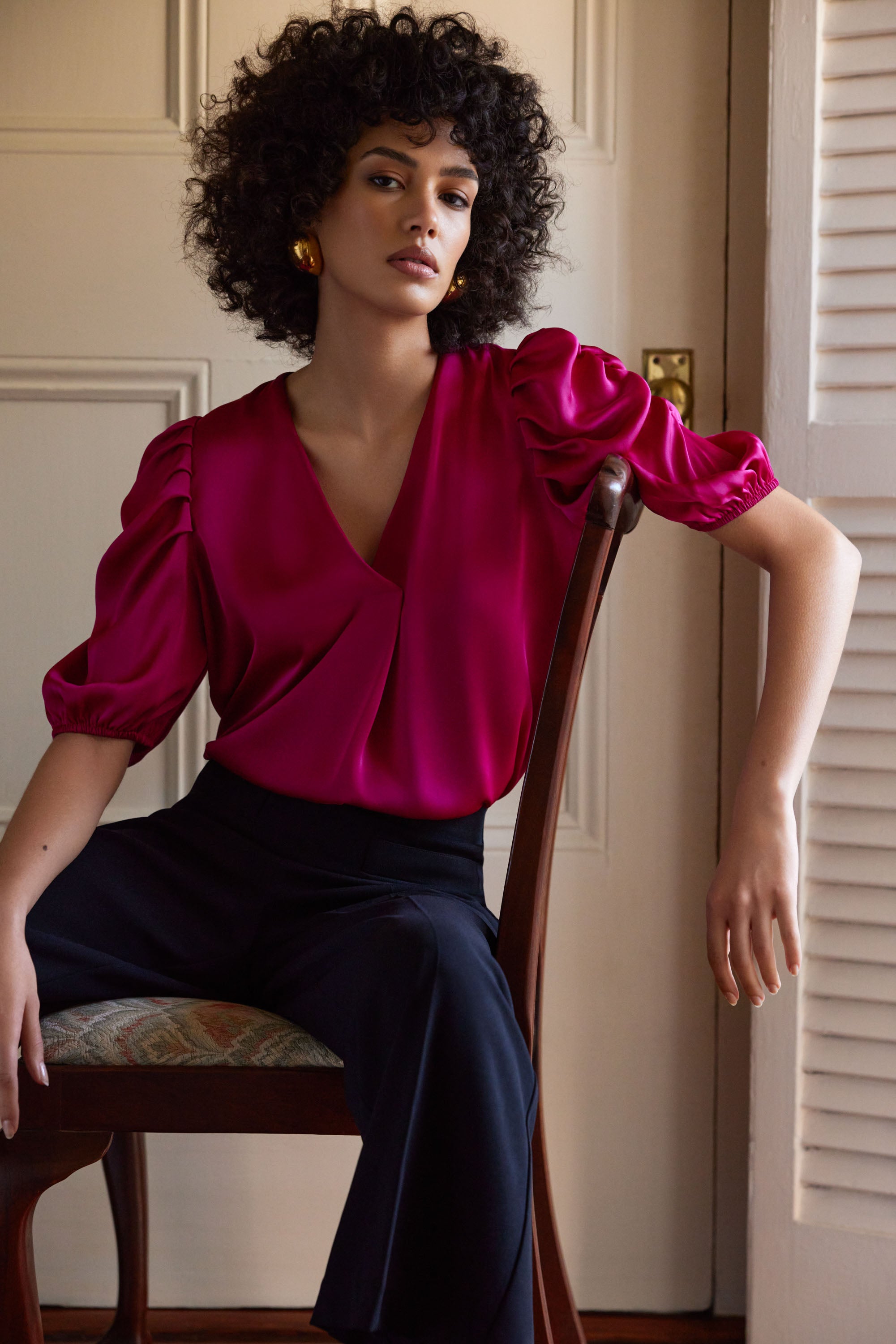 Blusa con mangas abullonadas fucsia 233026
