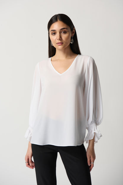 Blusa con mangas abullonadas blanco 233200