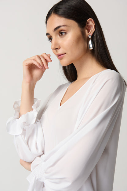 Blusa con mangas abullonadas blanco 233200