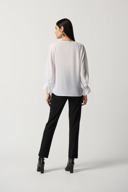 Blusa con mangas abullonadas blanco 233200