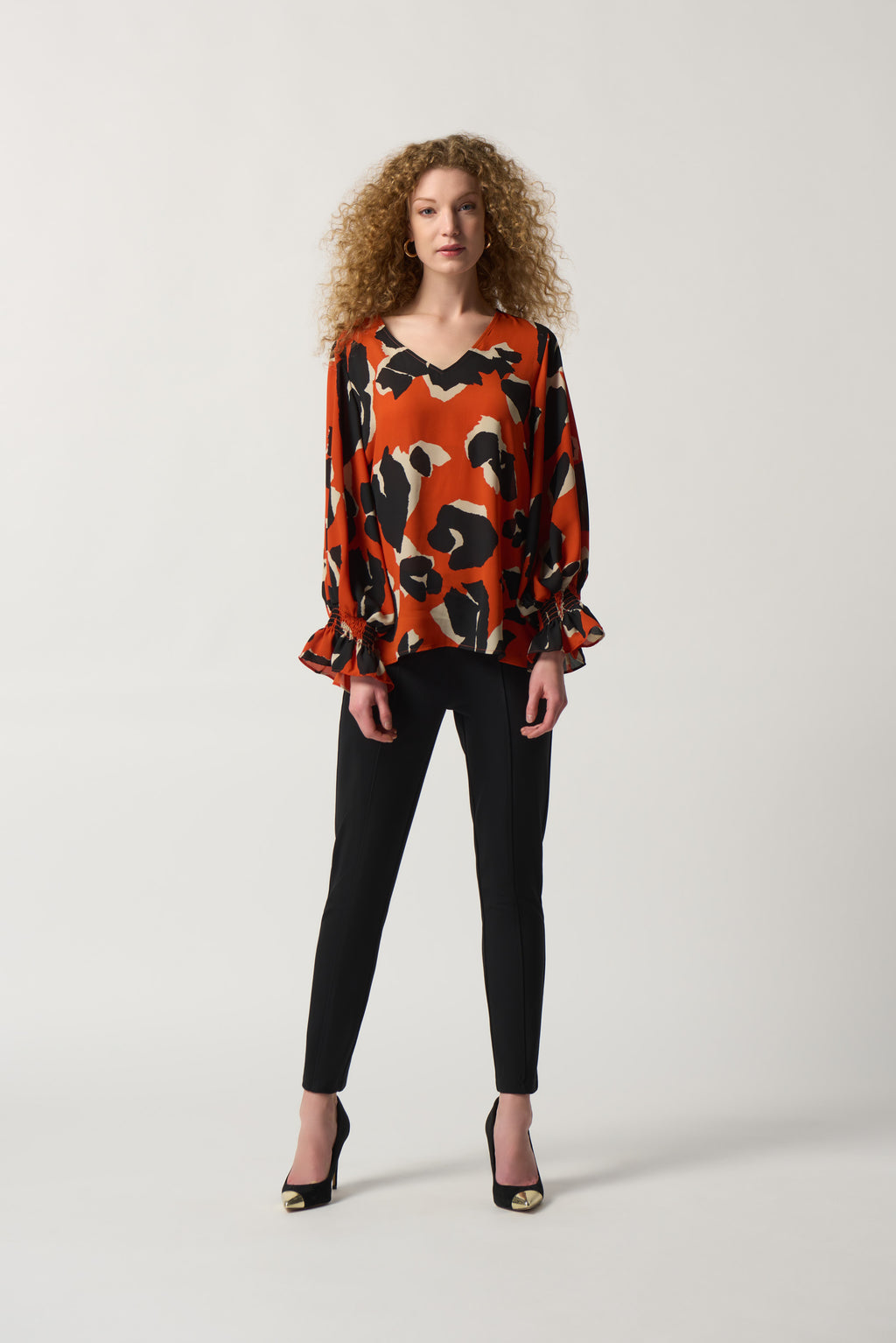 Blusa animal print naranja 233201