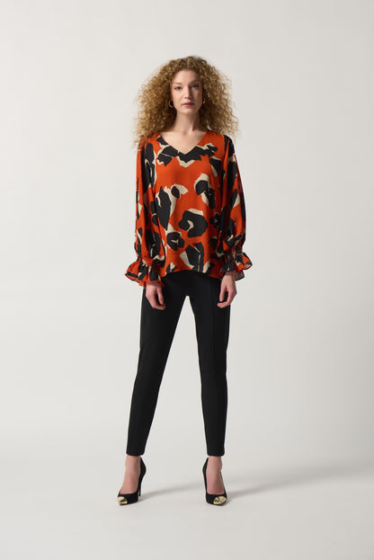 Blusa animal print naranja 233201