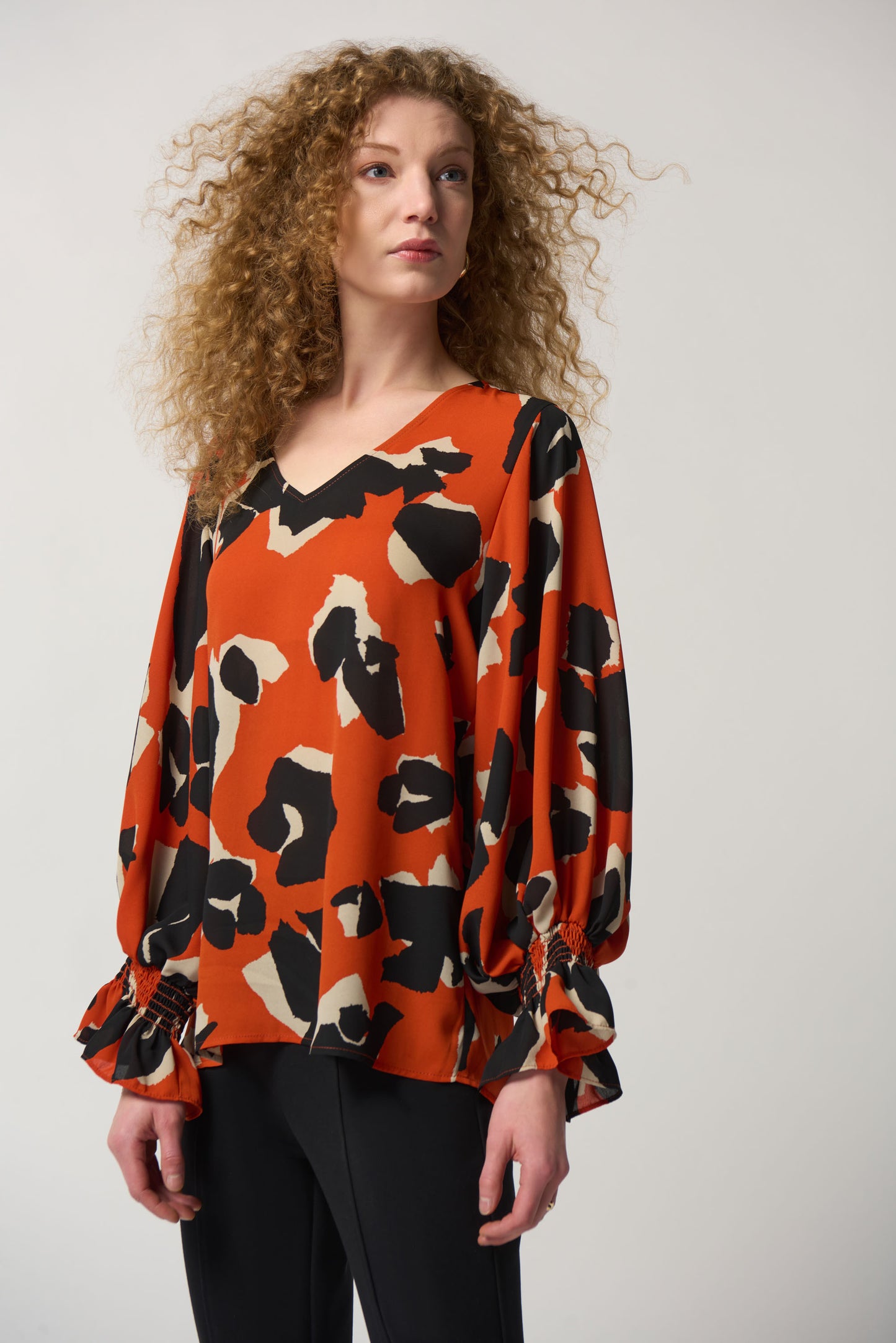 Blusa animal print naranja 233201
