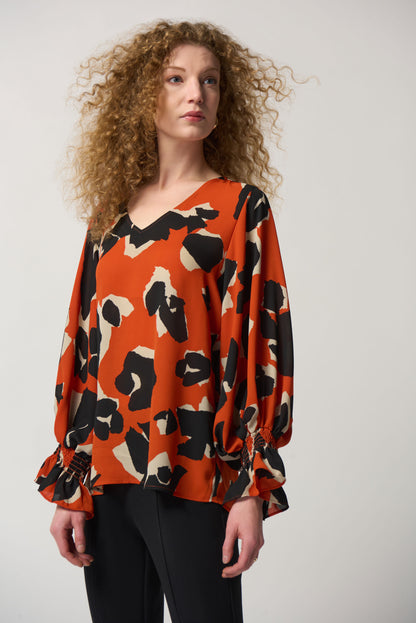 Blusa animal print naranja 233201