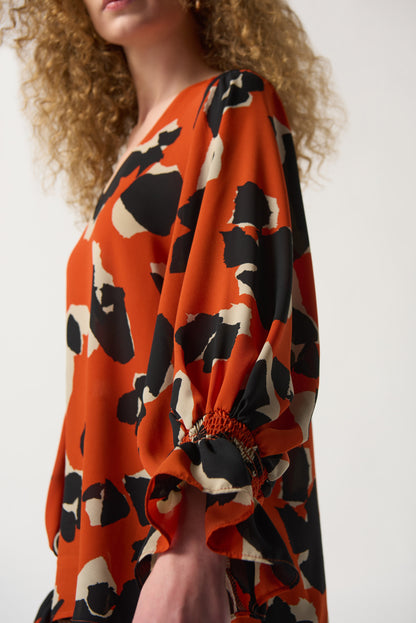 Blusa animal print naranja 233201