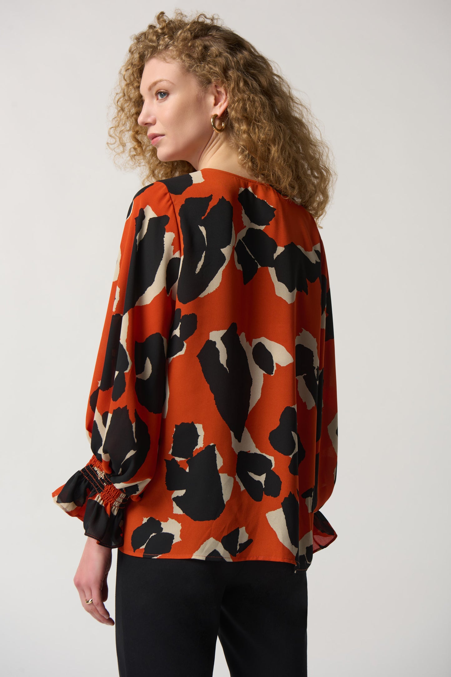Blusa animal print naranja 233201