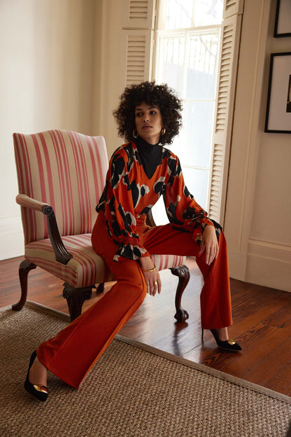 Blusa animal print naranja 233201