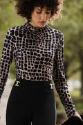 Blusa cuello alto animal print 233290