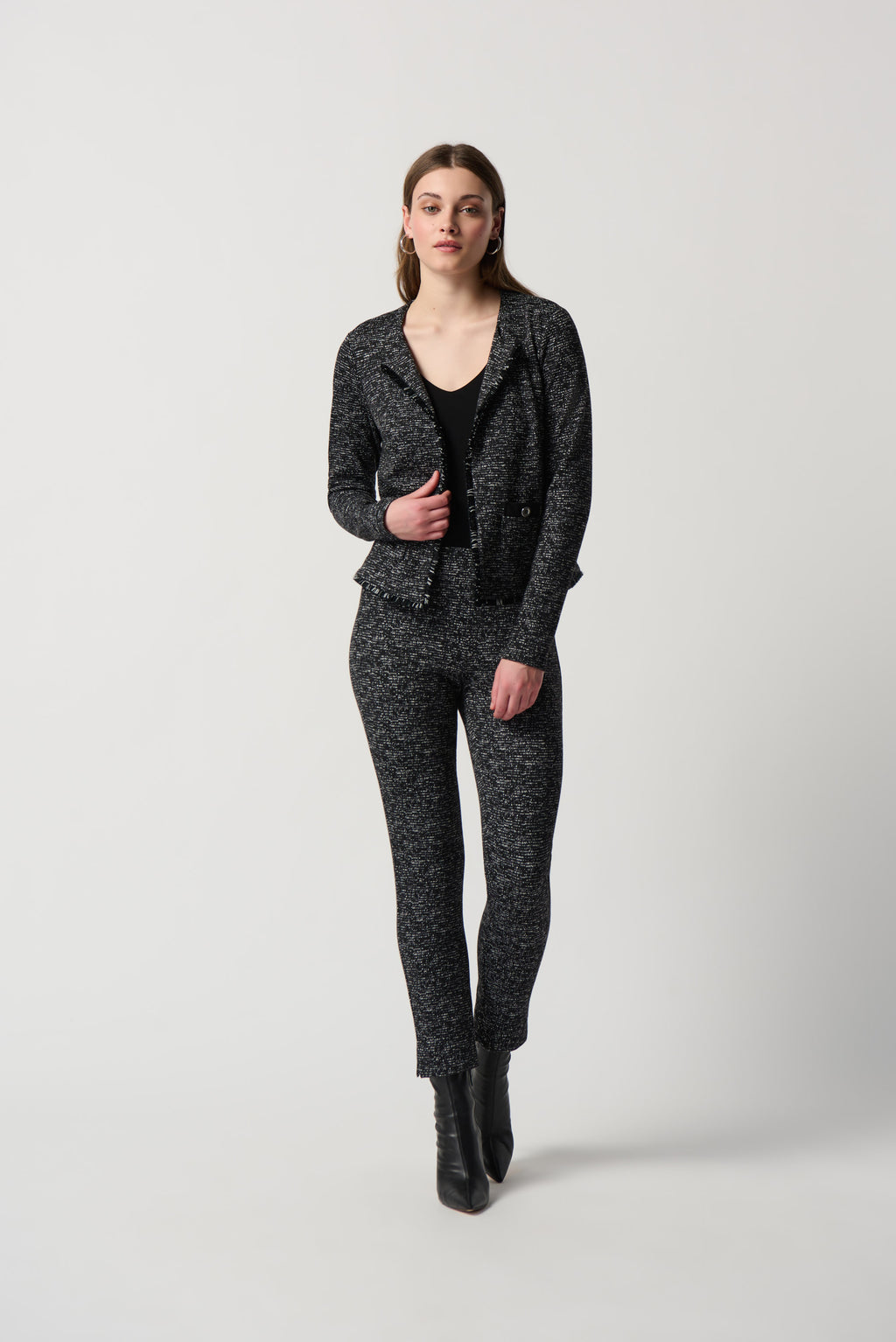Pantalón de punto jaspeado negro 234116