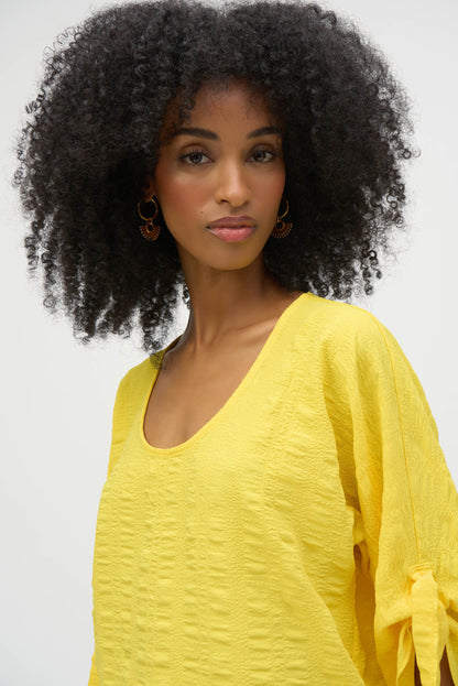 Blusa cuello redondo texturizada amarillo 252129