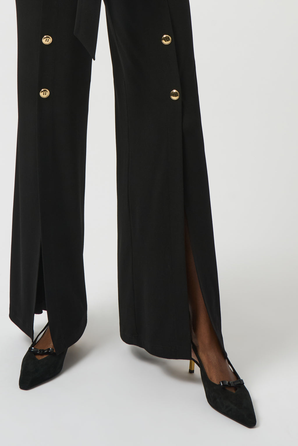 Jumpsuit con botones metálicos negro 253119