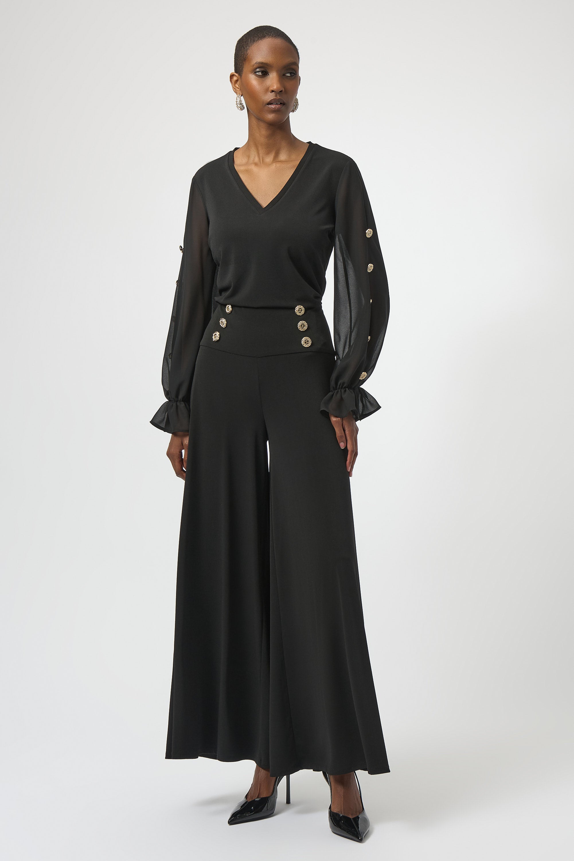 Blusa ajustada con mangas de gasa negro 254093