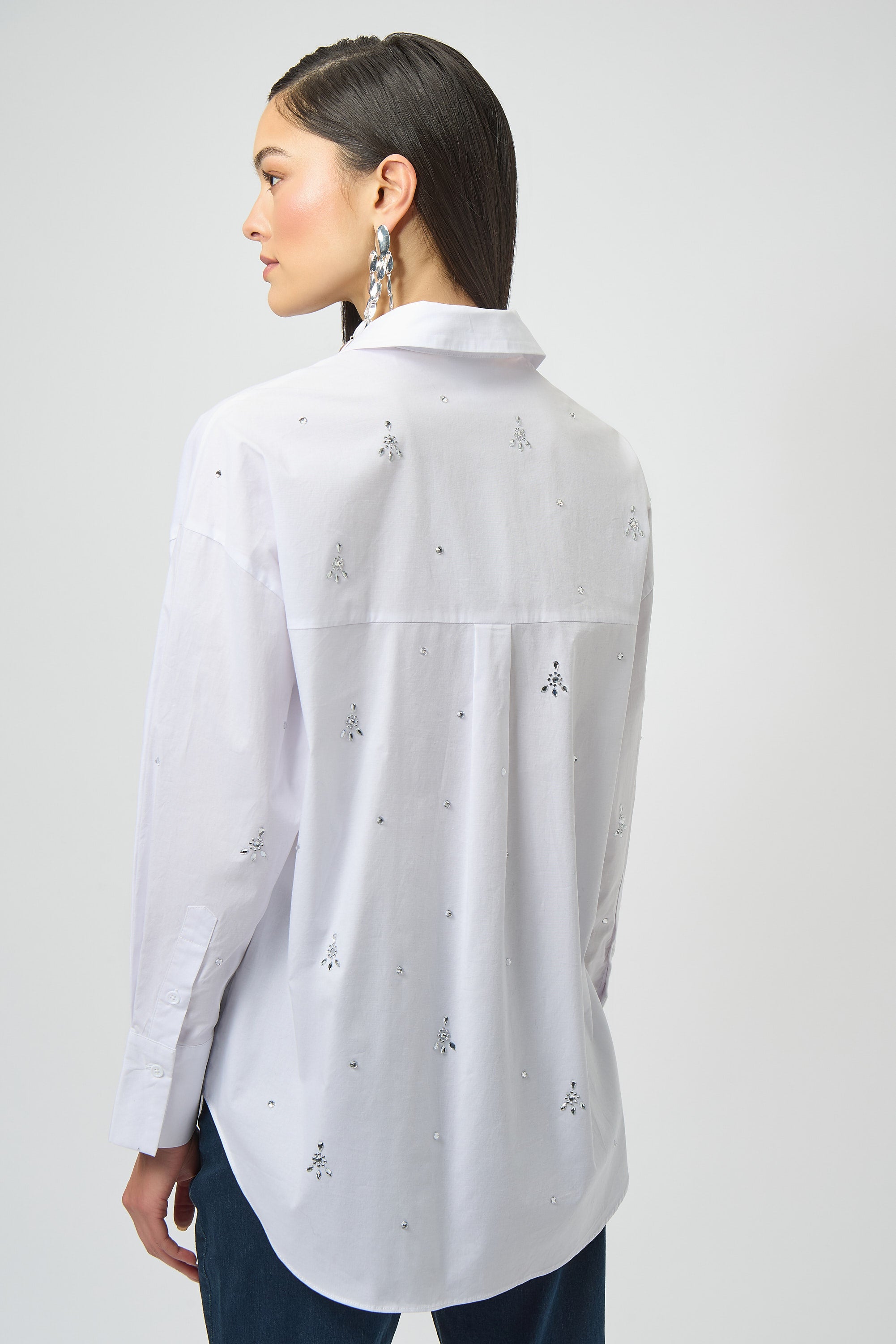 Blusa de popelina elástica con pedrería blanco254924