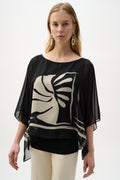 Poncho de punto de seda con estampado tropical y tejido transparente negro y vainilla 262200