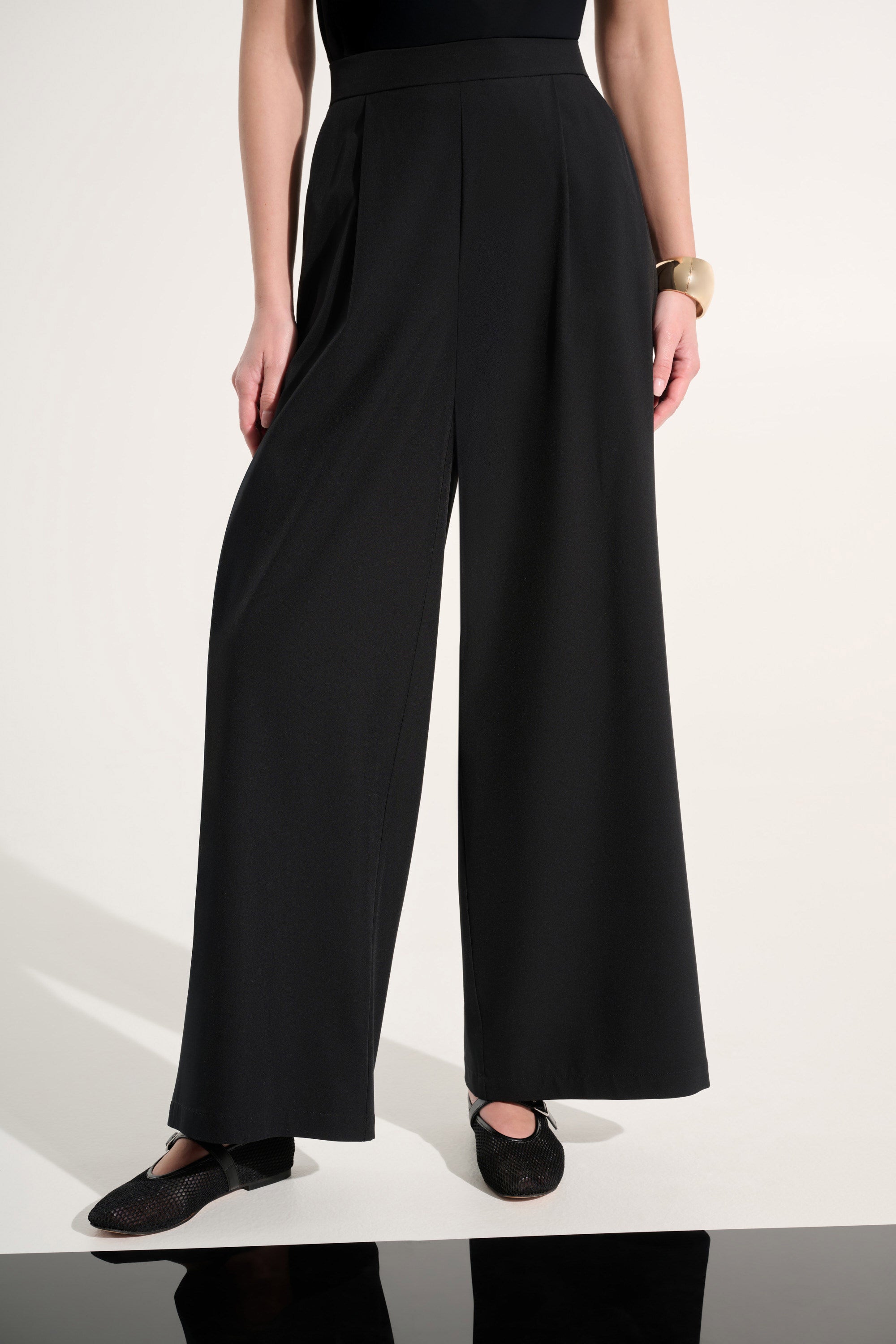 Pantalón ancho de tejido elástico negro 262622