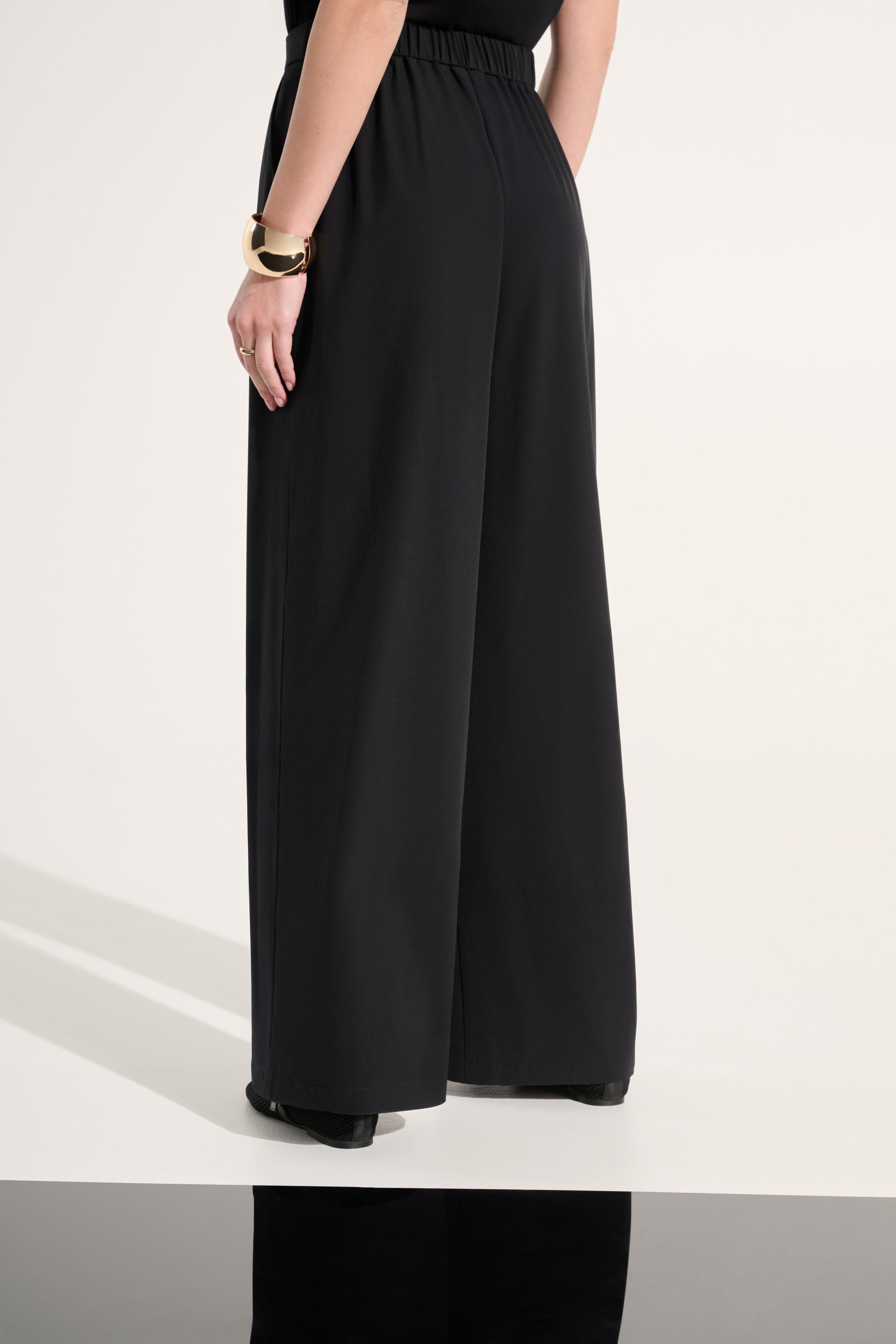 Pantalón ancho de tejido elástico negro 262622