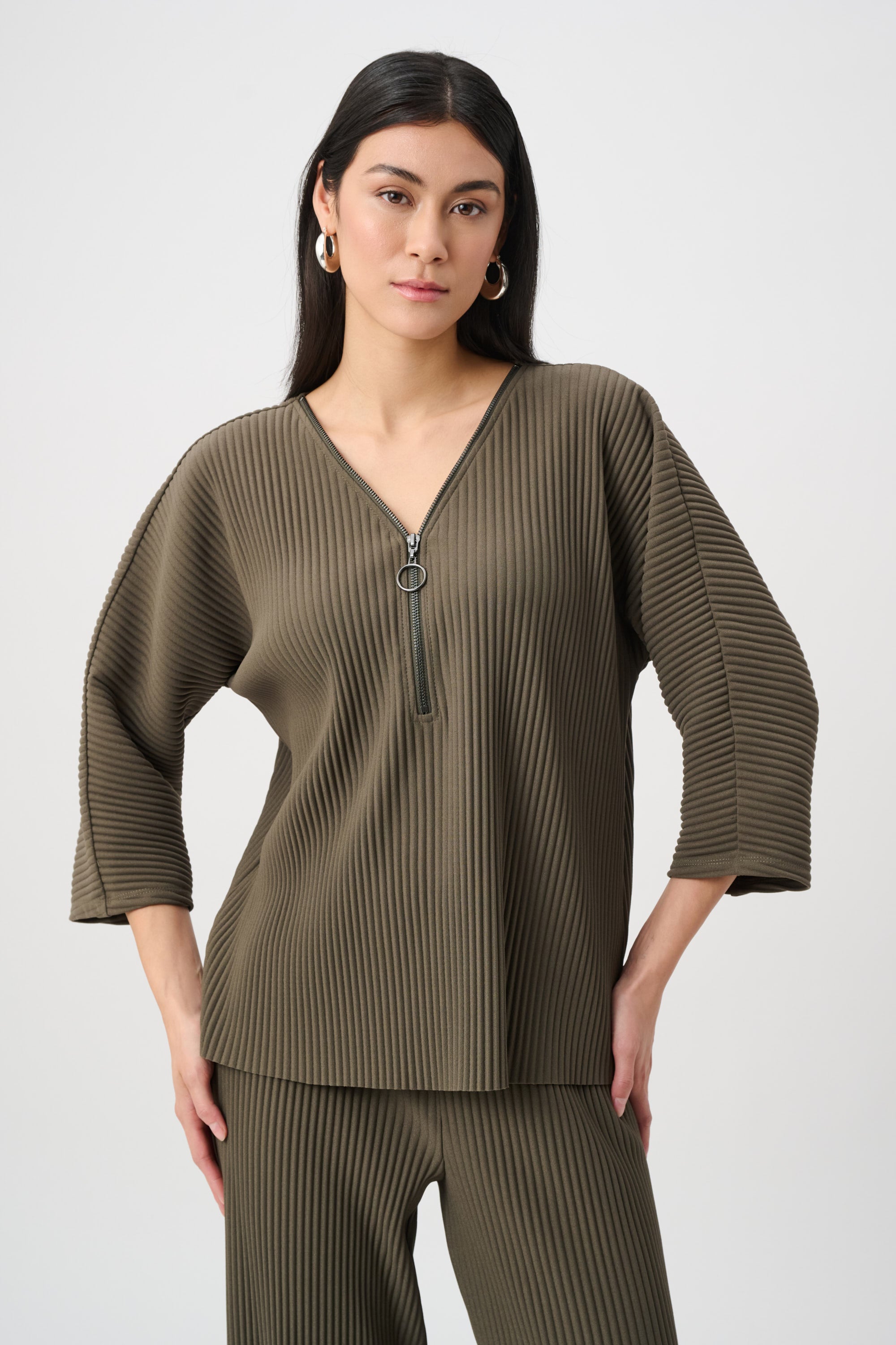 Blusa acanalada con cremallera verde aguacate 263123