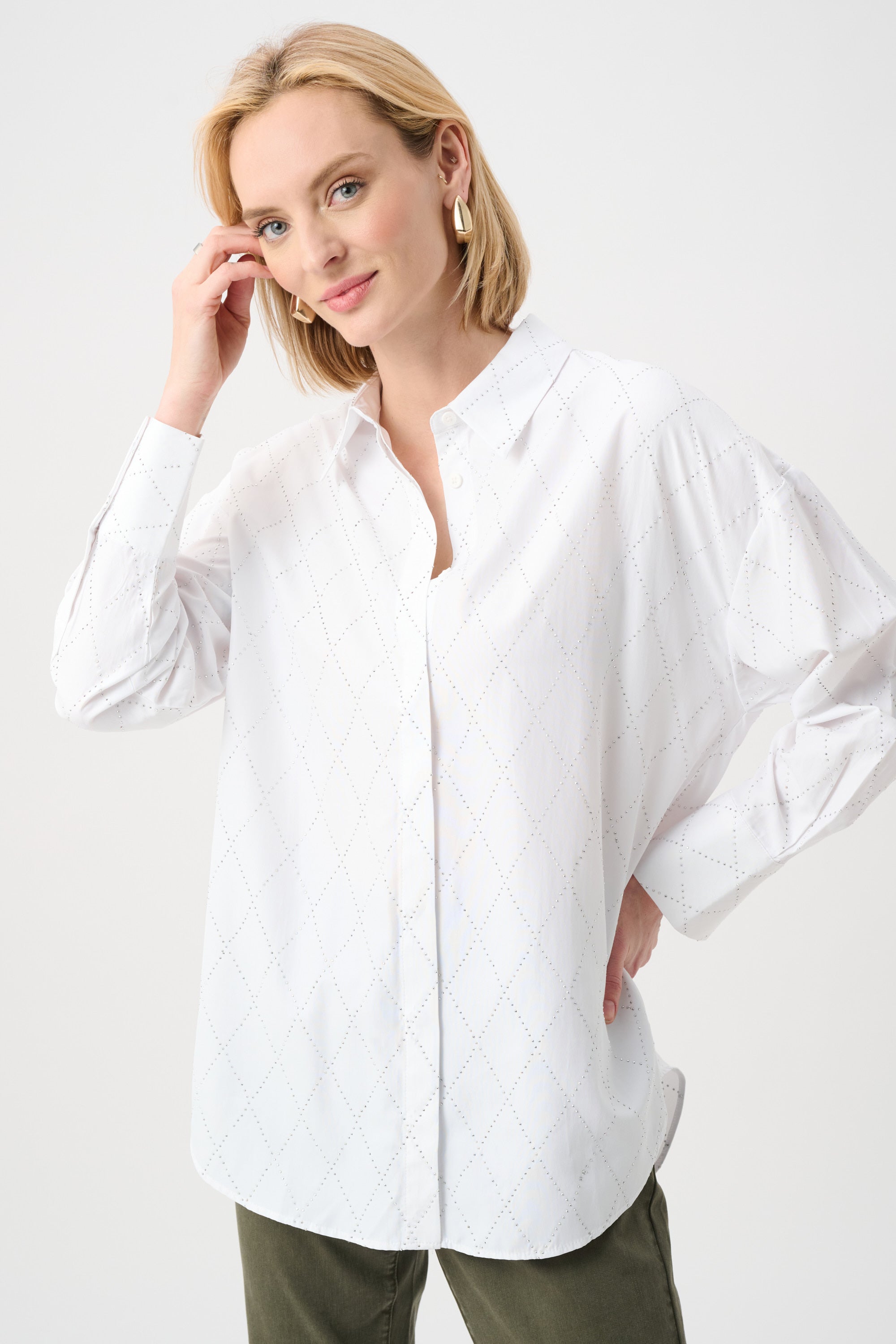 Blusa boxy con detalle de pedrería por toda la prenda blanca 263922