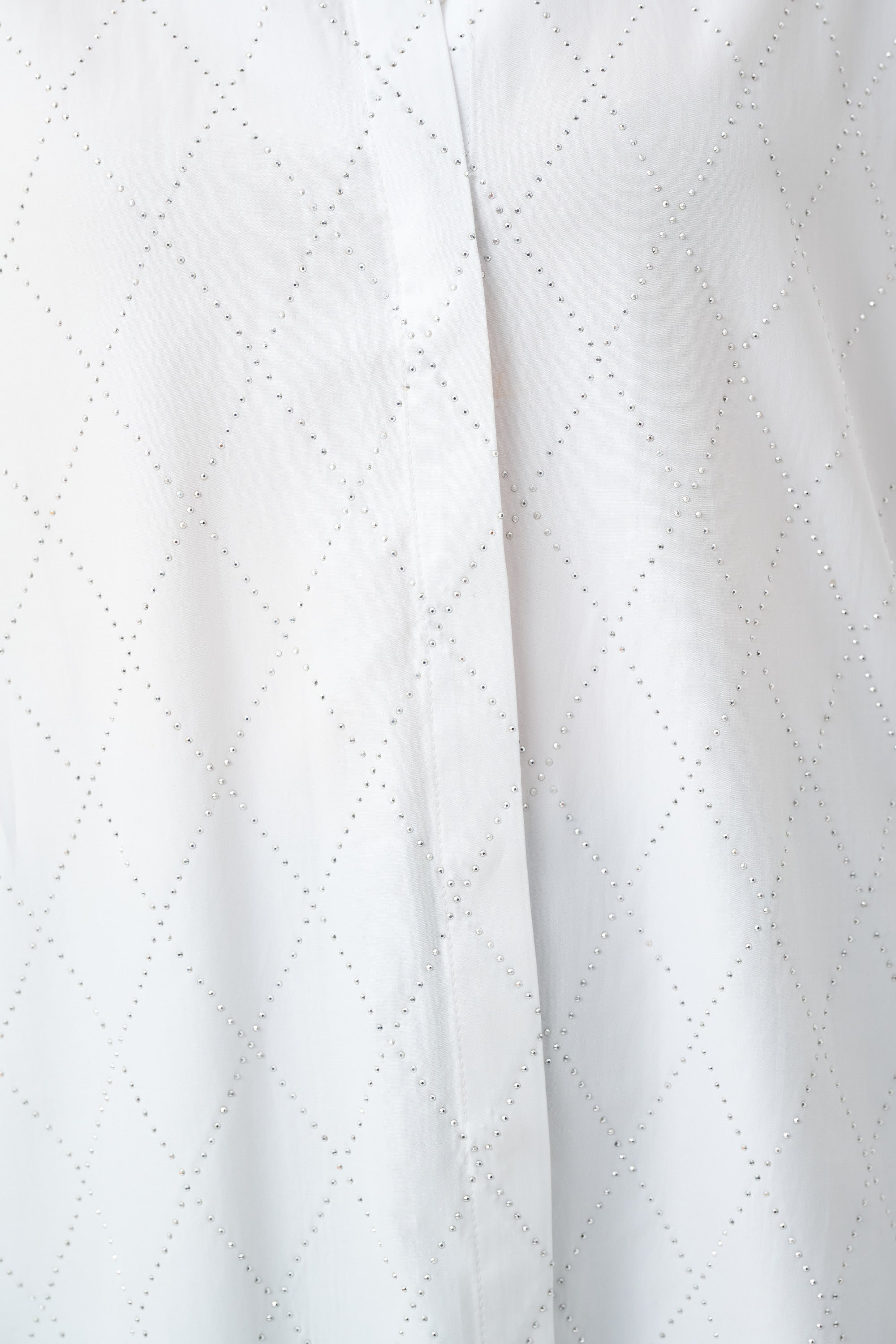 Blusa boxy con detalle de pedrería por toda la prenda blanca 263922