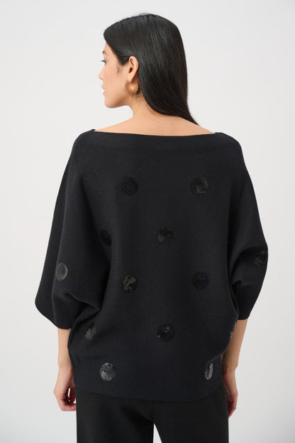 Blusa tejida boxy con bordado negro 263942