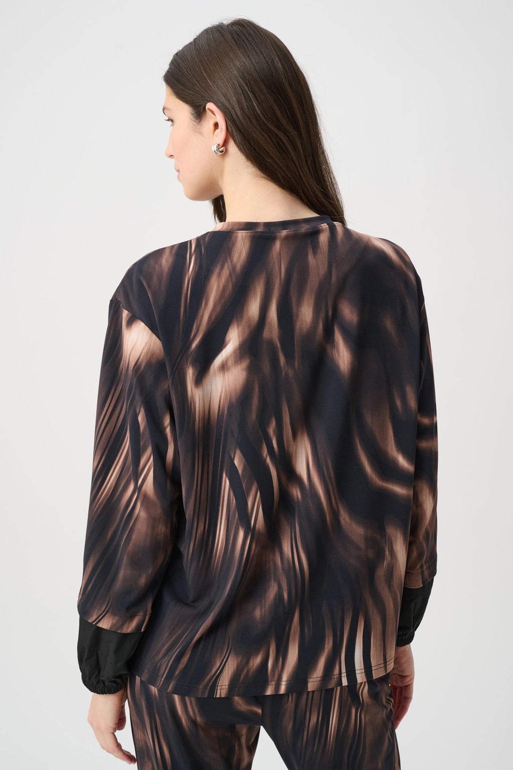 Top con mangas abullonadas animal print negro multicolor 264608
