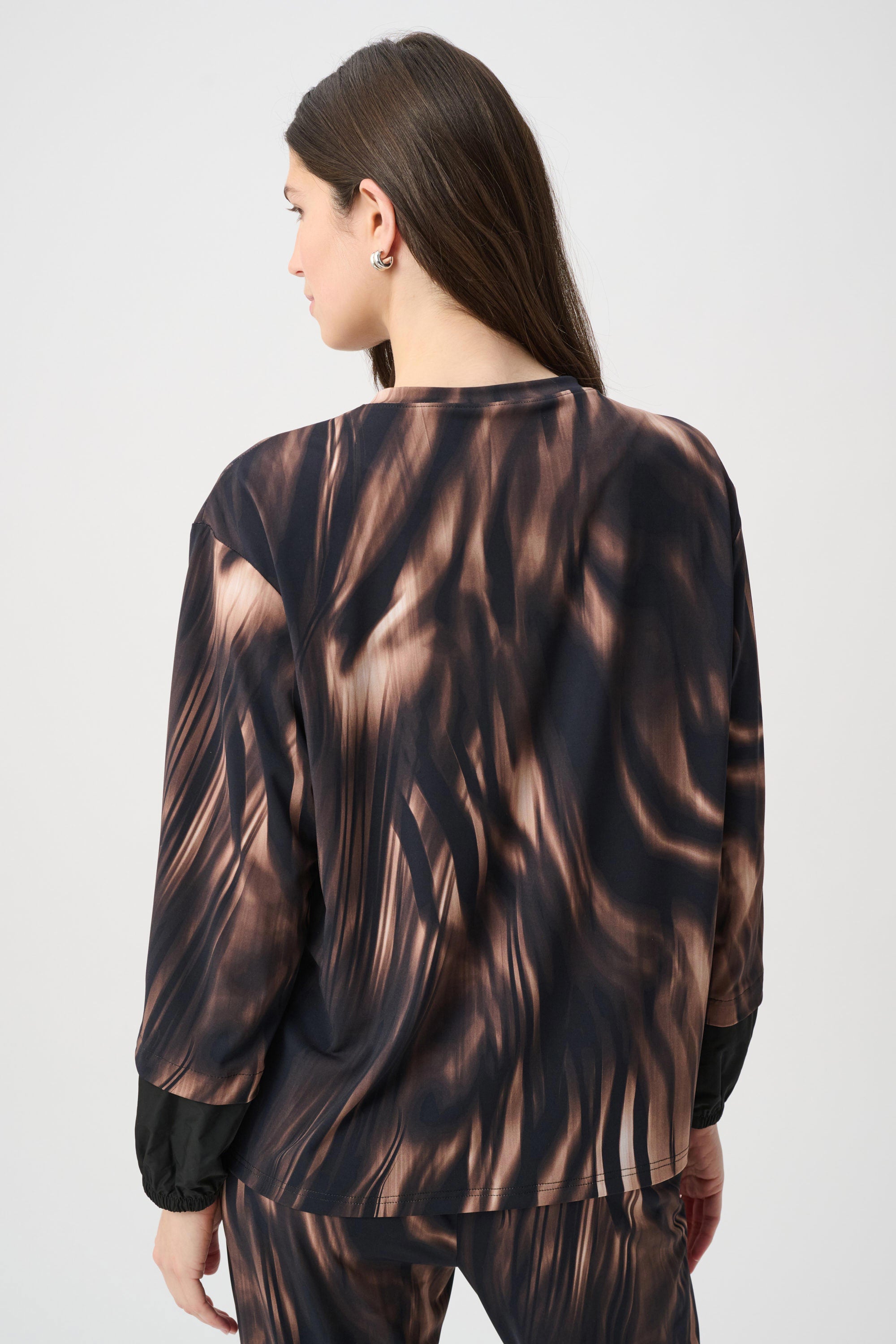 Top con mangas abullonadas animal print negro multicolor 264608
