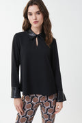 Blusa negra con ecopiel 223047