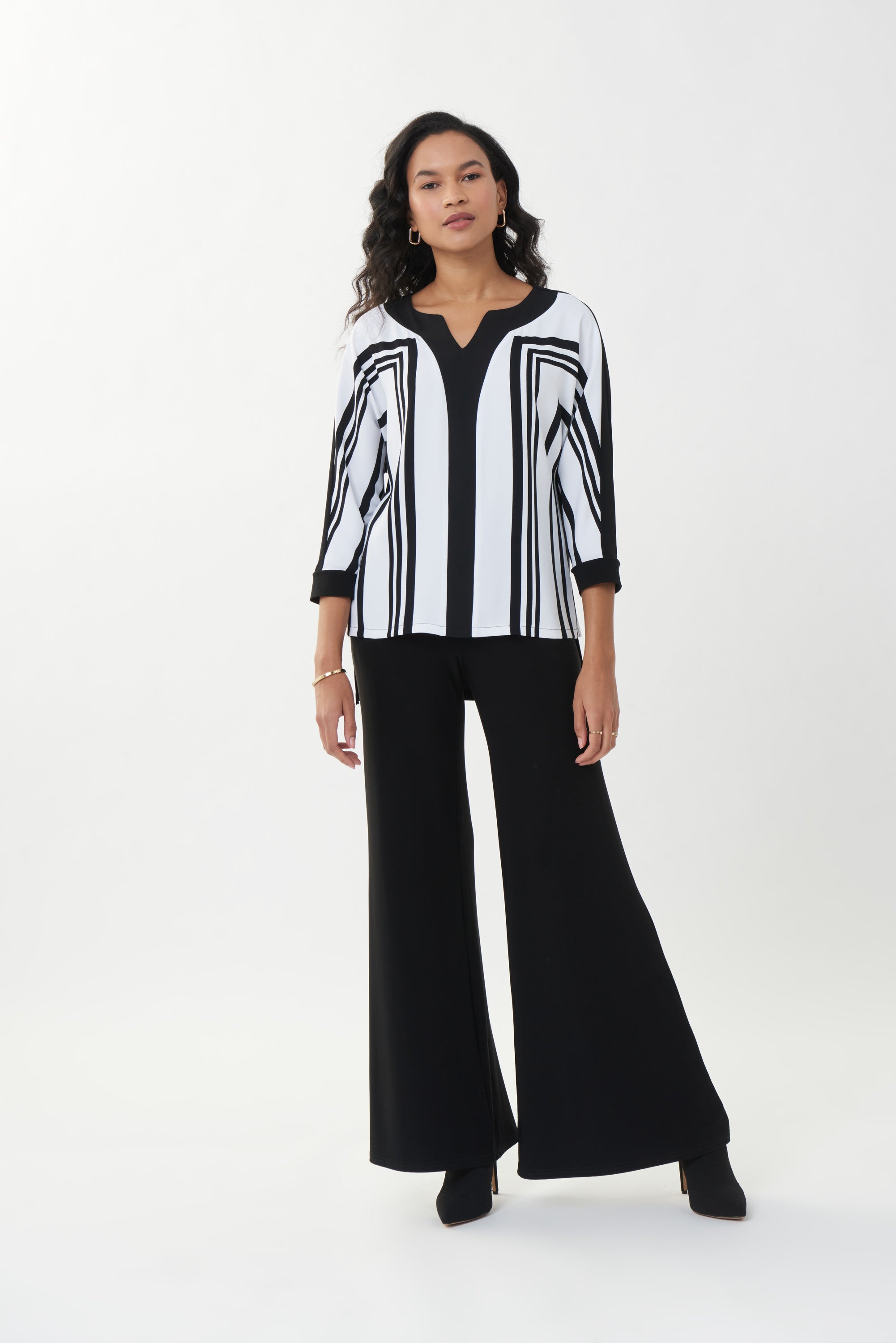 Blusa negra con rayas 223134